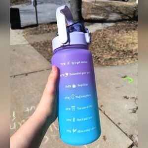 Gradient Blue and Purple Water Bottle with White Motivational Text on Side